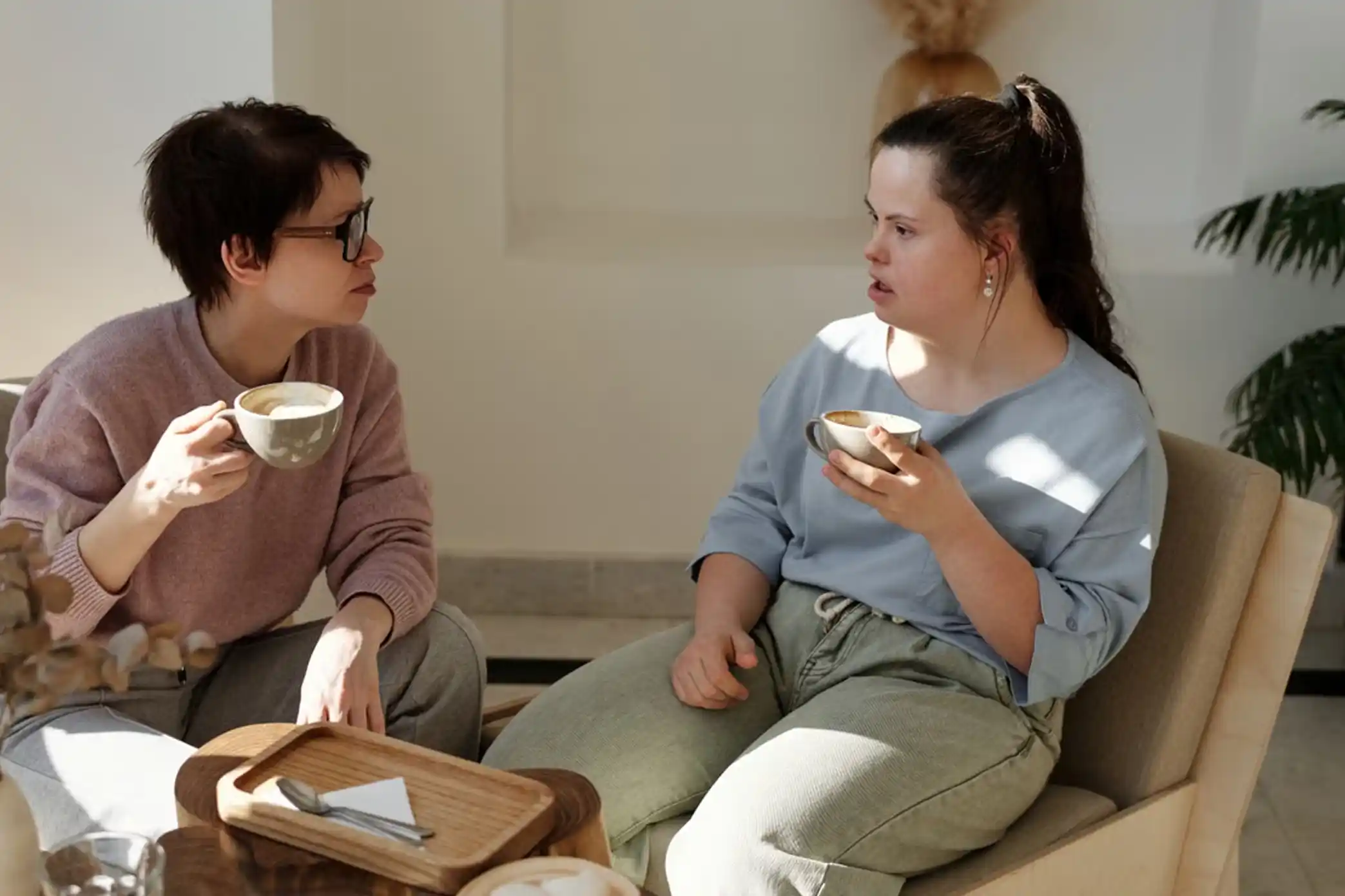 Support worker helping a participant with daily living tasks