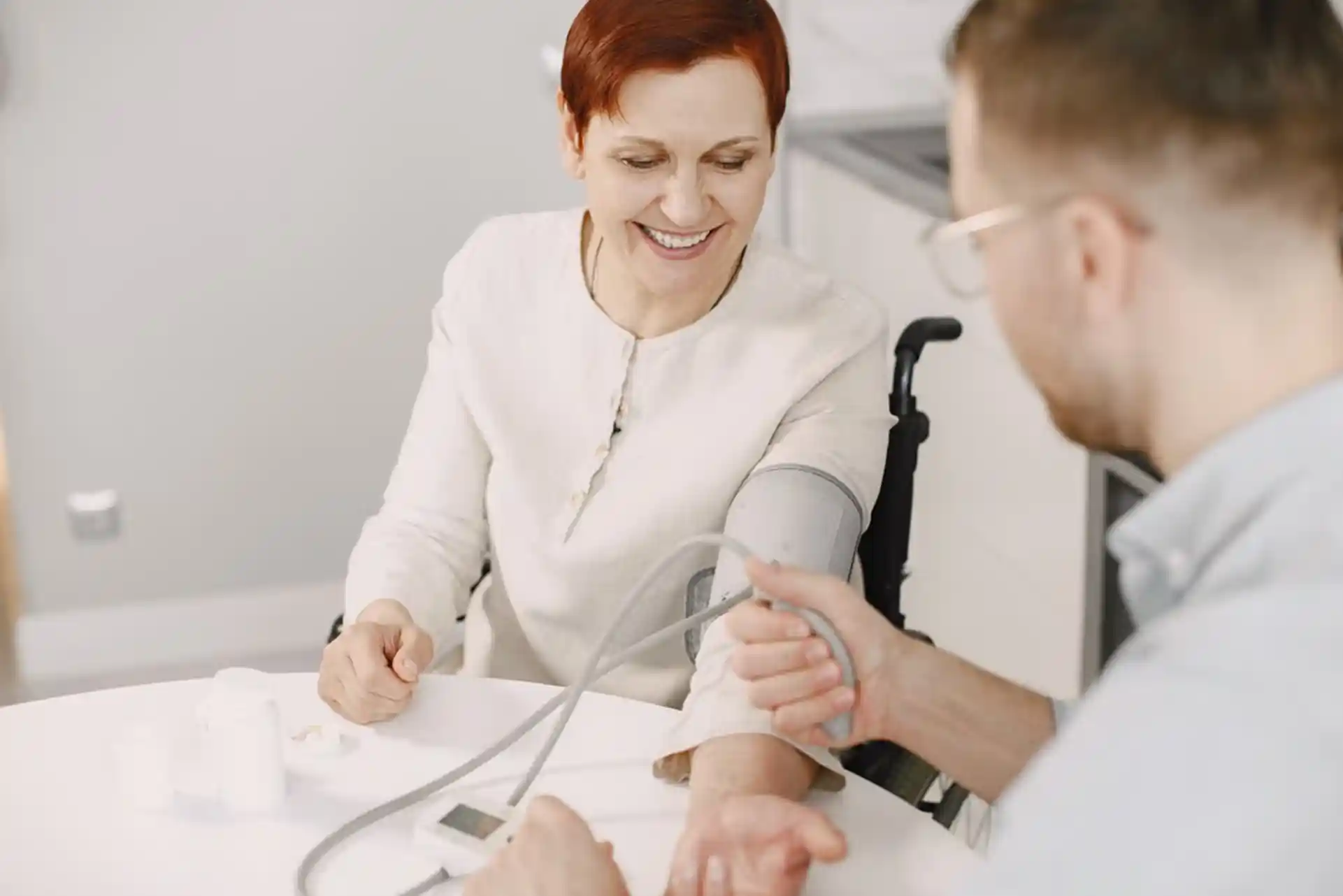 A support worker and NDIS participant sharing a genuine, respectful conversation